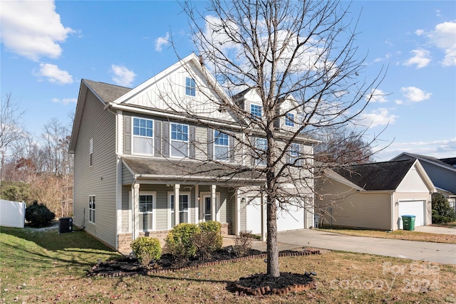 front of property featuring a front yard and central AC unit