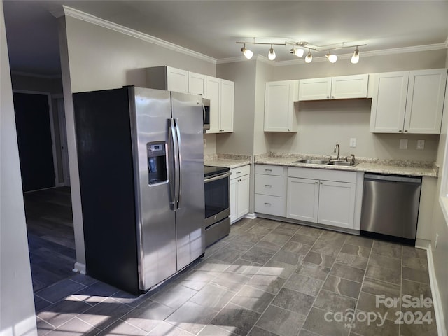 kitchen featuring white cabinets, crown molding, sink, and stainless steel appliances