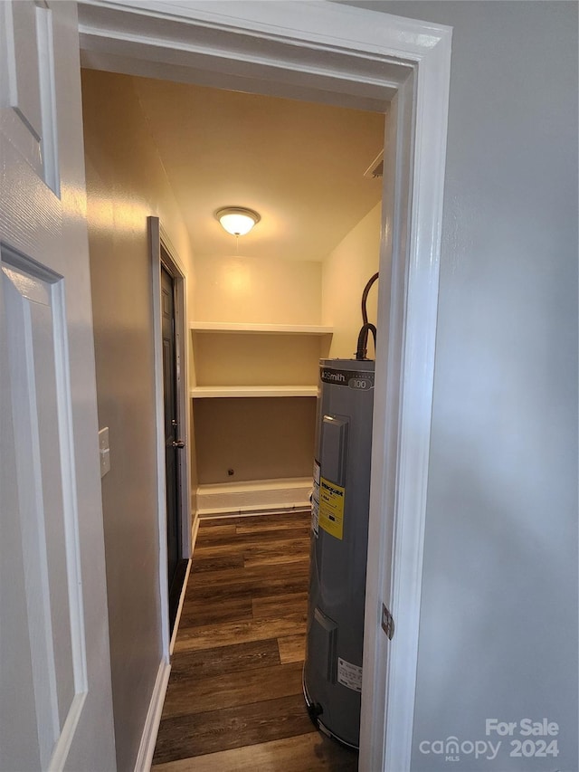 utility room with water heater