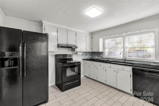 kitchen featuring white cabinetry, sink, crown molding, a textured ceiling, and black appliances