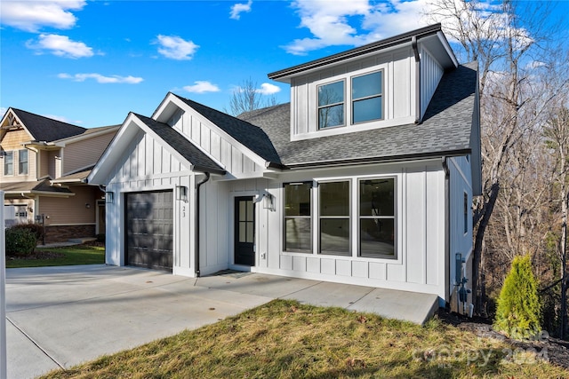 view of front of house with a garage