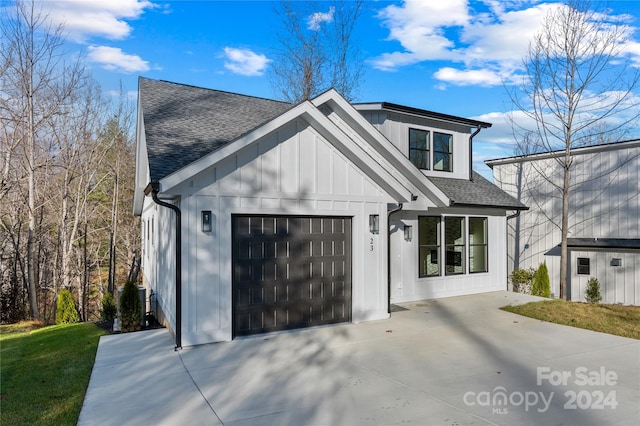 modern farmhouse with a garage