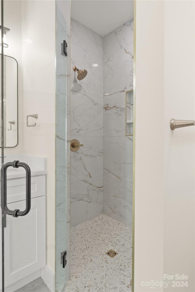 bathroom with walk in shower