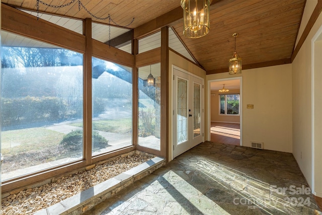 208 Dogwood Ln, Black Mountain, NC 28711 - doorway featuring lofted ceiling with beams, wooden ceiling, and a notable chandelier