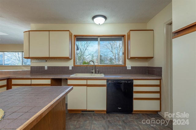 208 Dogwood Ln, Black Mountain, NC 28711 - kitchen with a textured ceiling, sink, cream cabinets, tile countertops, and dishwasher