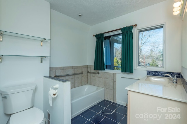 208 Dogwood Ln, Black Mountain, NC 28711 - bathroom featuring vanity, a bath, tile patterned floors, a textured ceiling, and tile walls