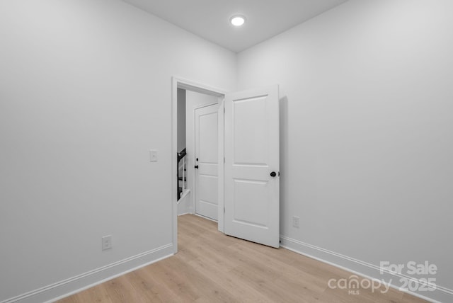 empty room featuring light hardwood / wood-style floors