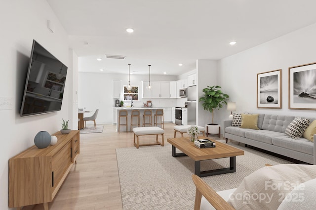 living room featuring light wood-type flooring