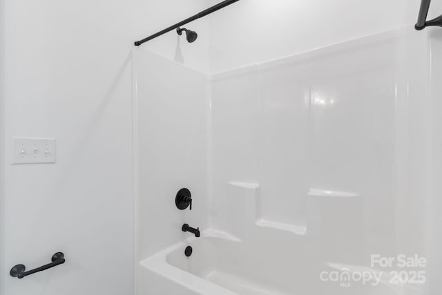 bathroom with shower / tub combination