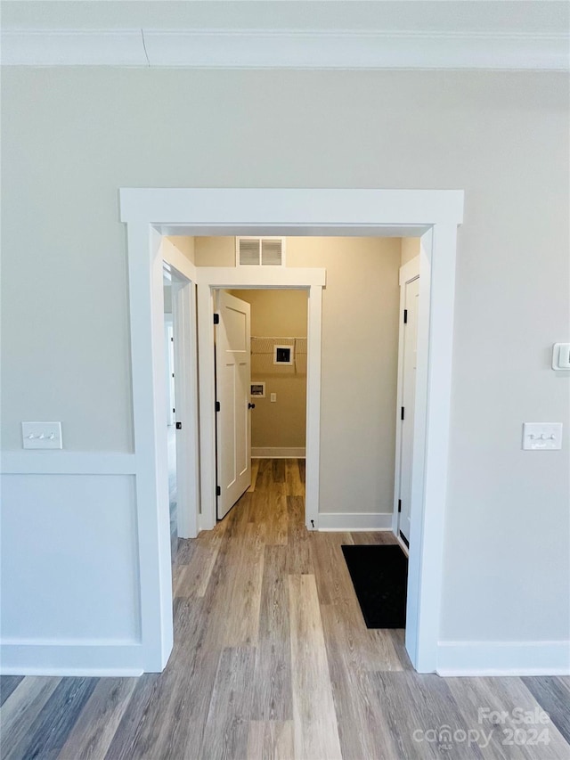 hall featuring light hardwood / wood-style floors