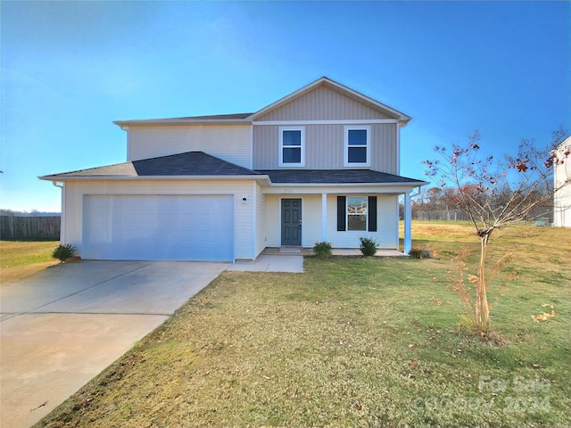 front facade featuring a porch, a garage, and a front lawn