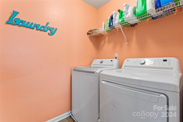 laundry area featuring washing machine and dryer