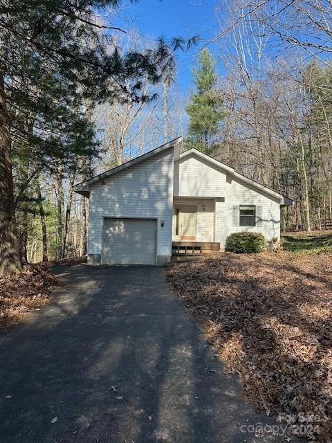 view of property exterior with a garage