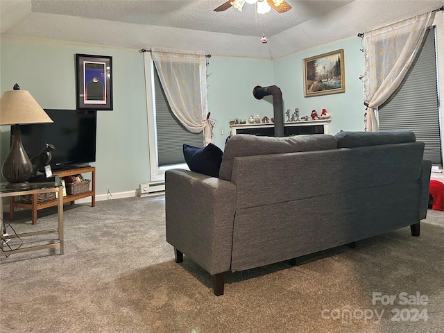 carpeted living room with ceiling fan, lofted ceiling, and a textured ceiling