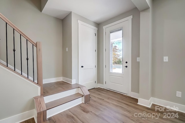 foyer with light hardwood / wood-style flooring