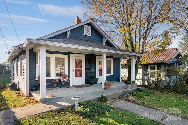 bungalow-style house featuring covered porch