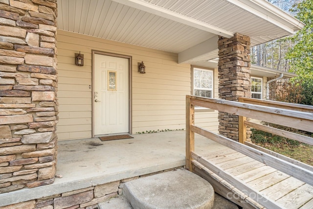 property entrance featuring covered porch