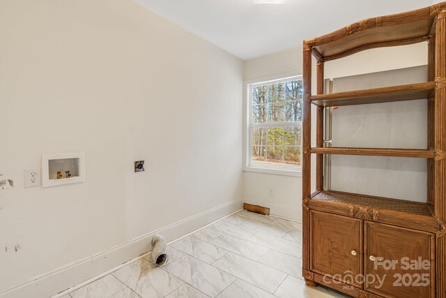 washroom with hookup for an electric dryer and washer hookup