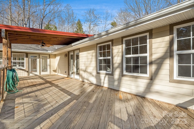 wooden deck with ceiling fan