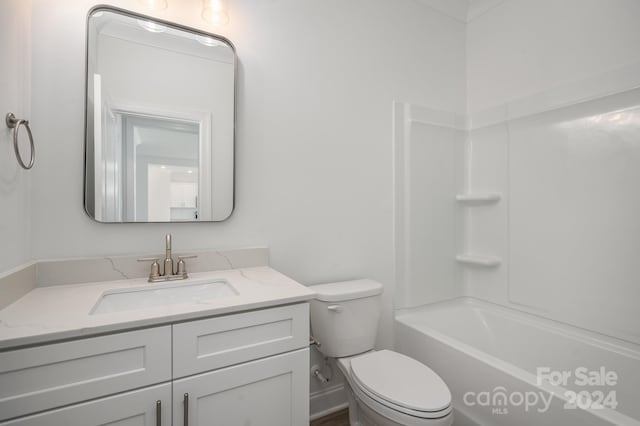 full bathroom featuring vanity, toilet, and tub / shower combination