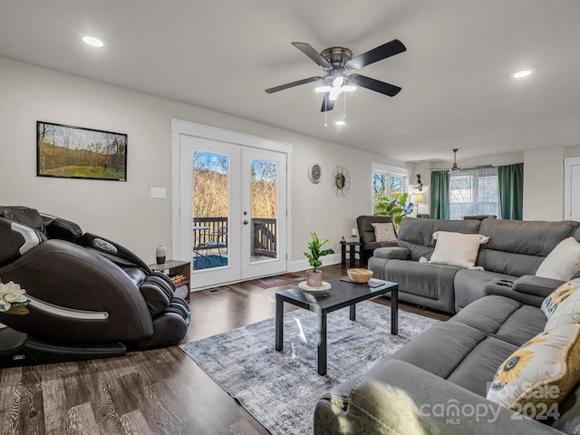 living room with dark hardwood / wood-style flooring, ceiling fan, and french doors