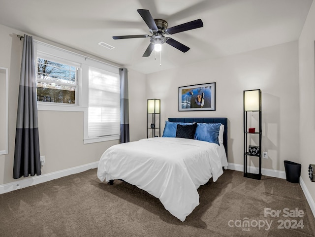 carpeted bedroom with ceiling fan