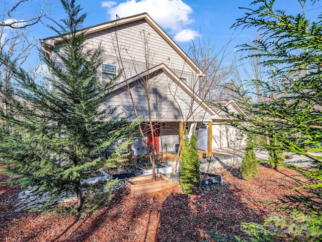 178 Flynn Ct, Lake Lure, NC 28746 - view of front of home with a garden