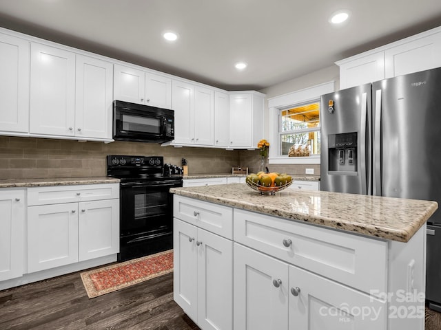 178 Flynn Ct, Lake Lure, NC 28746 - kitchen with recessed lighting, dark wood finished floors, black appliances, and tasteful backsplash