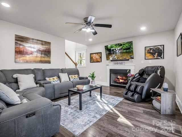 178 Flynn Ct, Lake Lure, NC 28746 - living area with wood finished floors, baseboards, ceiling fan, a warm lit fireplace, and recessed lighting