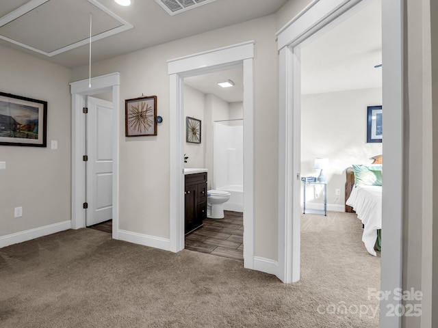 178 Flynn Ct, Lake Lure, NC 28746 - hall with baseboards, attic access, carpet flooring, and visible vents