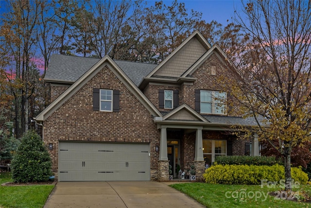 craftsman house featuring a garage