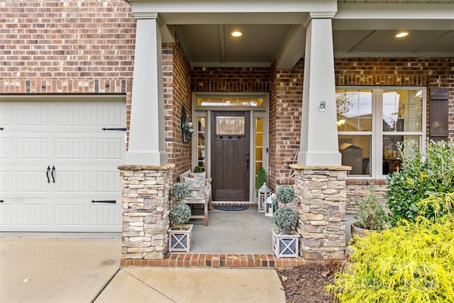 entrance to property featuring covered porch