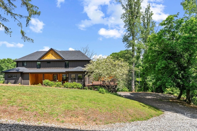 107 Beautyberry Dr, Asheville, NC 28801 - view of front of home with a front yard and gravel driveway