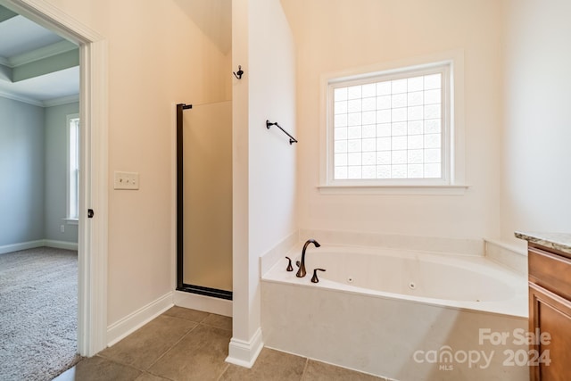 bathroom with separate shower and tub, tile patterned flooring, vanity, and ornamental molding