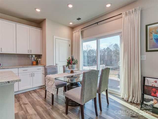 dining area featuring light hardwood / wood-style flooring