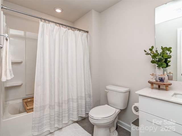 full bathroom with shower / bath combination with curtain, vanity, and toilet