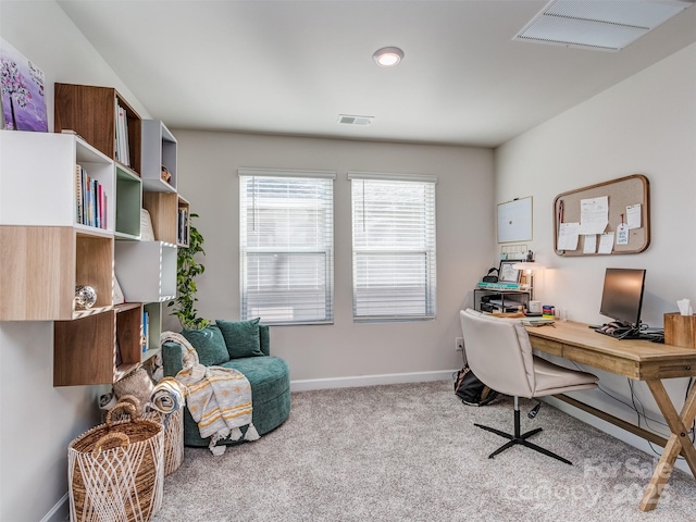 office area with light colored carpet