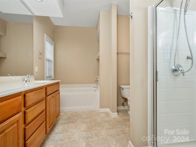 full bathroom with plus walk in shower, vanity, and toilet