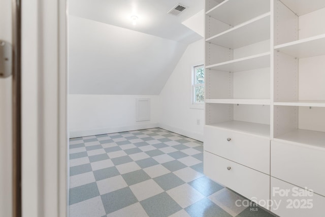 bonus room with vaulted ceiling