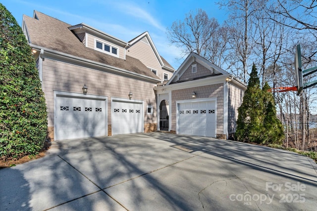 view of property exterior featuring a garage