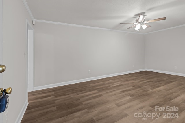 unfurnished room featuring a textured ceiling, dark hardwood / wood-style floors, ceiling fan, and crown molding