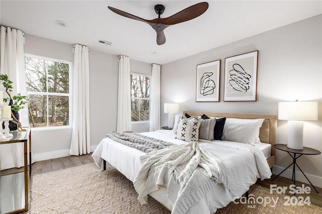 bedroom featuring ceiling fan and wood-type flooring