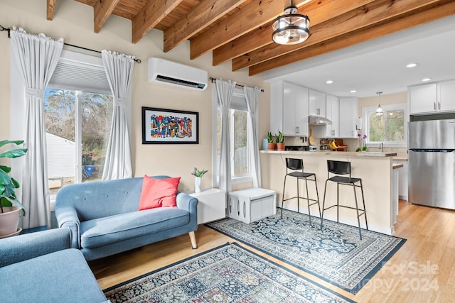 living room with beam ceiling, wood ceiling, light hardwood / wood-style floors, and a wall mounted air conditioner