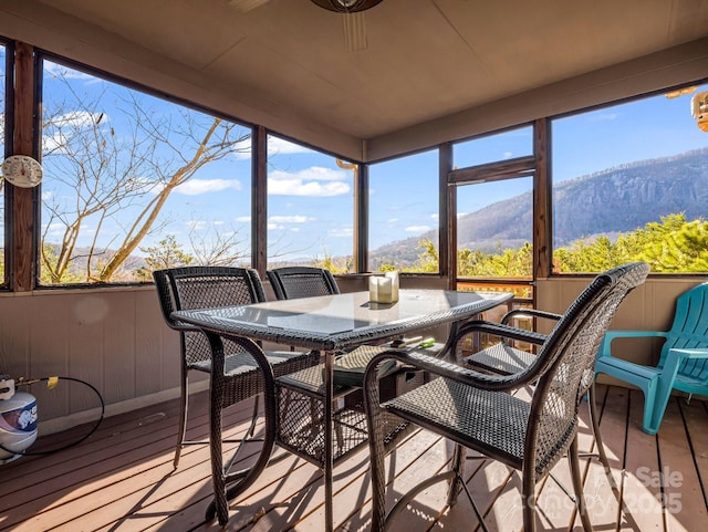 sunroom with a mountain view