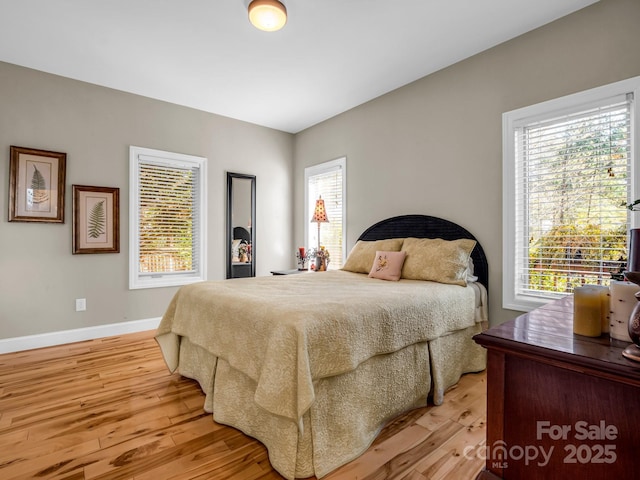 bedroom featuring light wood-type flooring