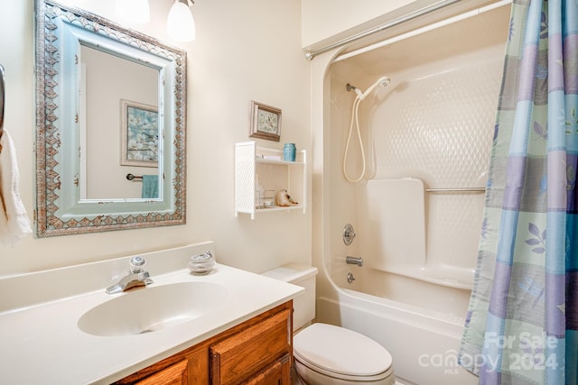 full bathroom featuring vanity, toilet, and shower / tub combo with curtain