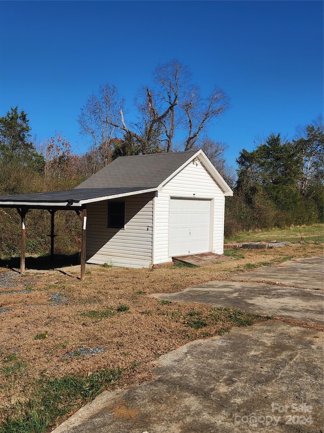 garage with a carport