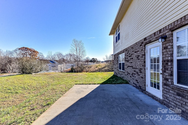 view of yard with a patio area