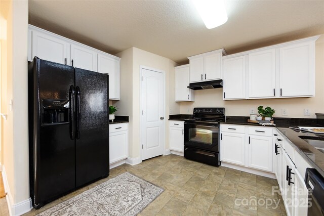 kitchen featuring white cabinets and black appliances