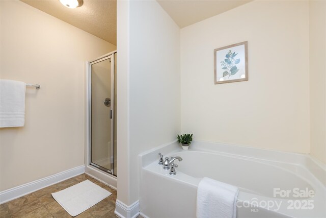 bathroom with plus walk in shower